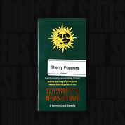 Grünes Barney’s Farm Cherry Poppers Päckchen mit Sonnenlogo, Aufschrift 3 feminisierte Samen und Website Hinweis